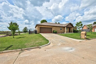 2 Car garage with iron fencing.