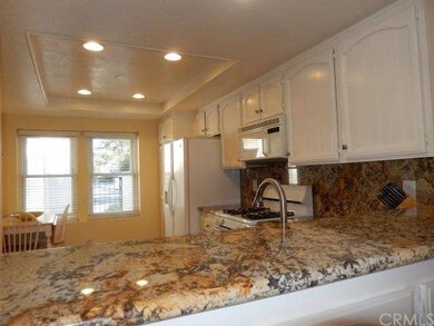 Lots of cabinets and pantry (other side of refrig)