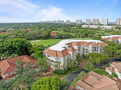 Aerial view of city skyline and a tree filled landscape