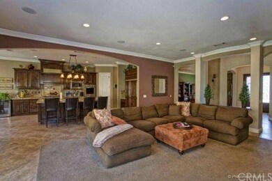 Great room with view of kitchen and entry in main 