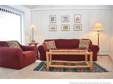 Living Room. New carpeting installed in unit February 2013.
