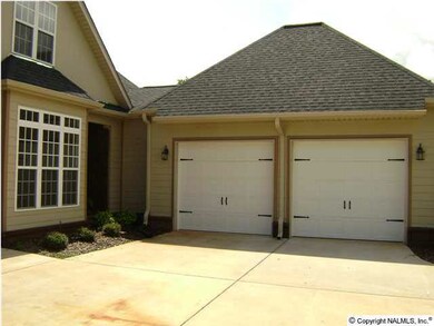 Close view of oversized two car garage.