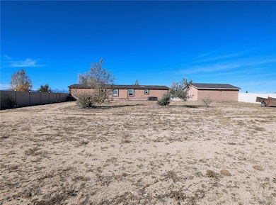 7335 Chelsey Way, Peyton, CO 80831 - photo 2