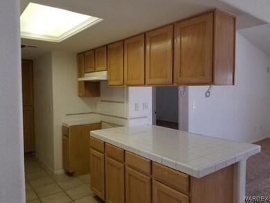 Kitchen looking to living room
