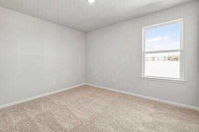 The two additional bedrooms in the home are perfec