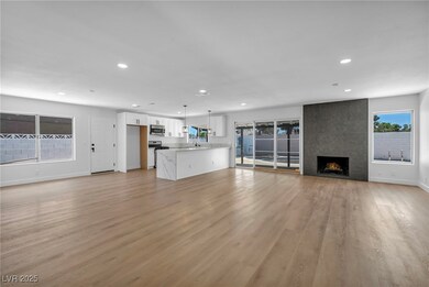 Unfurnished living room with recessed lighting, li