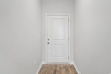 Entryway featuring hardwood / wood-style flooring