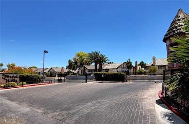 View of street with a residential view, a gate, an