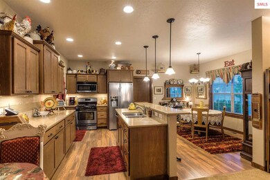 Granite counters, Breakfast Bar, pendant lighting,