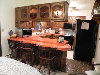 Kitchen is open to the dinette area.