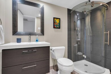 2nd Bath with seamless round glass enclosure
