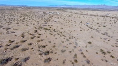 Birds eye view of property with a mountain view and a desert view