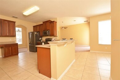 The kitchen is open to the living room and breakfa