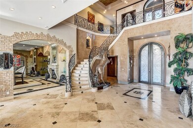 Grand Foray. Spiral staircase leads to 4 ensuite b