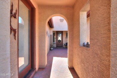Entry to courtyard & casita on rt.