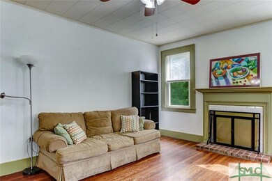 Spacious and bright living room with original wood