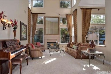 LIVING ROOM IS OPEN TO FORMAL DINING AND HAS 2ND O