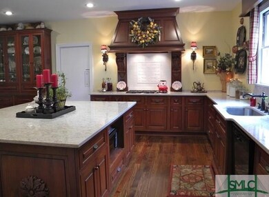 Gourmet kitchen with Hanstone quartz countertops, 