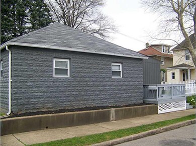 Exterior Back. Very little yard work included!