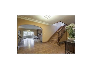 Entry hall looking toward Living Room & Sunroom.