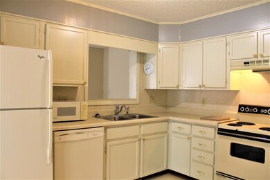 Kitchen with pass-through to Living Room