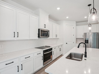 Photo is not of the actual home, but is an inspirational photo of builder’s model home and may depict options, furnishings, and/or decorator features that are not included