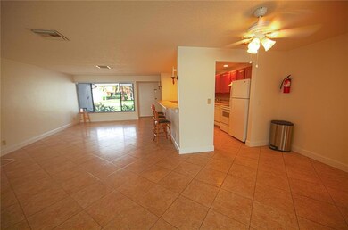 L-shaped living and dining .