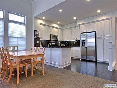 Dining room and kitchen.