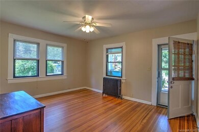 Airy and bright living room with radiators that you rarely see any more.