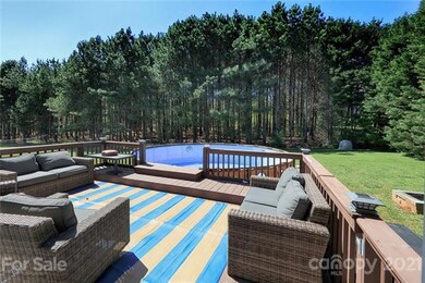 Private backyard with deck/pool (just being filled