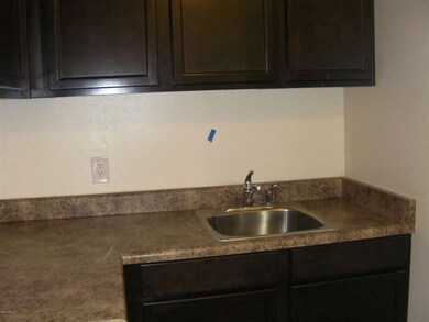 sink and cabs in laundry rm