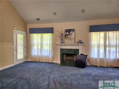 Great Room with Vaulted Ceiling and Wood-burning F