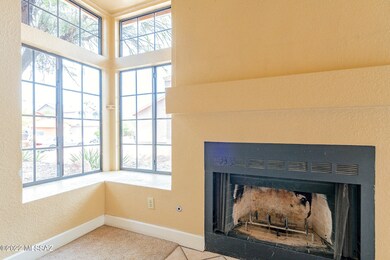 Fireplace and double window bench