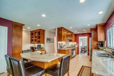 Kitchen w/ island and office niche.