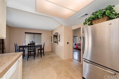 Open kitchen with plenty of seating for everyone t