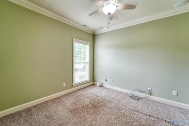 This room is isolated at the front of the home and has a private bath. lt could be the 4th bedroom or an office.