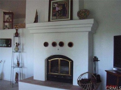 Woodburning fireplace with heatilator