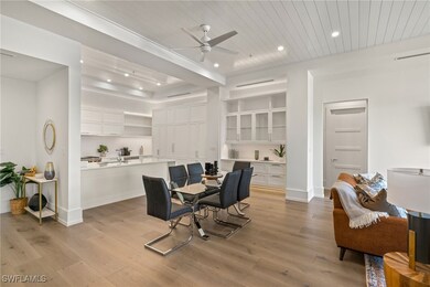 Dining space featuring baseboards, wooden ceiling,
