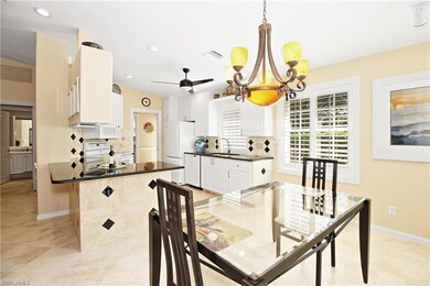 Counter height granite breakfast bar.
