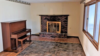 Living Room w Brick fireplace