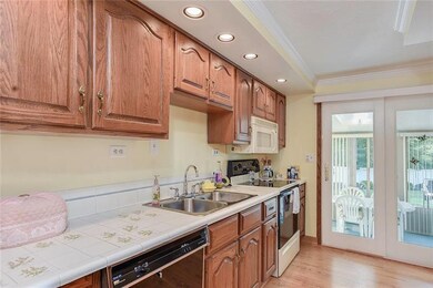 1792 RENEE KITCHEN VIEW TO ENCLOSED PATIO