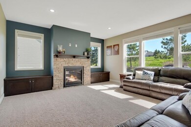 The living room's gas fireplace is a wonderful cen