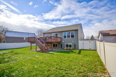 10902 Woodedge Dr unit 38, Allendale, MI 49401 - photo 2