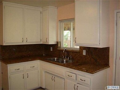 Full granite backsplash.