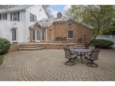 Imagine entertaining outside on the large paved pa