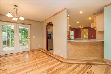 View from dining area to eat in kitchen.
