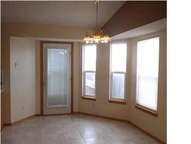 Lovely Dining Room with Bay Out Windows & New Tile