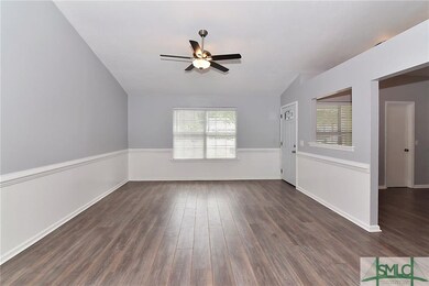 LIVING ROOM LOOKING INTO KITCHEN