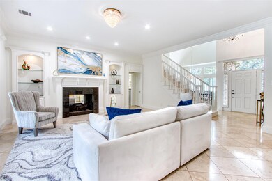 Large Formal Living Area with 2-sided Gas Fireplac