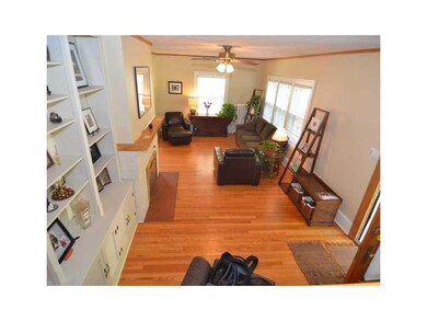 Living Room. Hardwood, fireplace, built-ins.